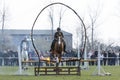 Horse police fire barrier jumping Royalty Free Stock Photo