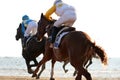 Horse races in the beach Royalty Free Stock Photo