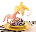 Horse racing carnival event luncheon table place setting with lens flare. Royalty Free Stock Photo