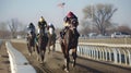 Horse racing competition running towards finish line. Jockey during horse races on his horse goes towards finish line. Traditional Royalty Free Stock Photo