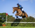 Horse rider competing in Cross Country Event.