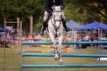 Horse and Rider Show Jumping At A Country Show