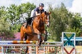 Horse rider woman on show jumping competition Royalty Free Stock Photo