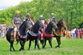 Horse riders on the battle field. Royalty Free Stock Photo