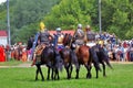 Horse riders on the battle field. Royalty Free Stock Photo