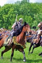 Horse riders on the battle field. Royalty Free Stock Photo