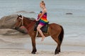Horse riding on the beach Royalty Free Stock Photo