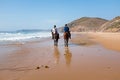 Horse riding at the beach at the ocean Royalty Free Stock Photo