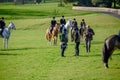 Horse riding fox hunters and a couple of photographers in an English countryside setting waiting for the hunt to begin Royalty Free Stock Photo