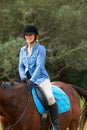 Horse riding, nature or happy woman in countryside outdoor with rider or jockey for recreation or wellness. Sports Royalty Free Stock Photo