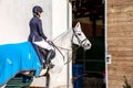 Horse riding . Young girl riding a horse . Equestrian sport in details. Royalty Free Stock Photo