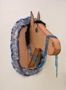 The horse's head made of cardboard packaging