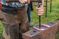 Horse shoe being crafted by blacksmith/farrier Royalty Free Stock Photo