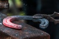 Horse shoe being crafted by blacksmith/farrier Royalty Free Stock Photo