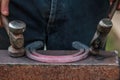 Horse shoe being crafted by blacksmith/farrier Royalty Free Stock Photo