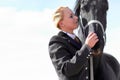 Horse, sport and woman on equestrian training and competition ground with blue sky. Outdoor, sun female competitor and