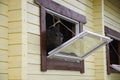 Horse in a stable window in the village Vladykino in Russia