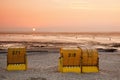Horse with tent at sunset in the North sea in Germany. Royalty Free Stock Photo