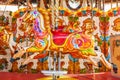 Horse on a traditional fairground vintage carousel in Cardiff