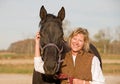 Horse and Woman Laughing Royalty Free Stock Photo