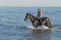 Horse woman in the sea Royalty Free Stock Photo