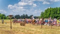 Horseback archery show with flying arrow to the target