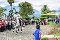 Horseback cowboy rides in village, Guatemala Royalty Free Stock Photo