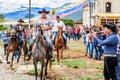 Horseback cowboys in village, Guatemala