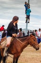 Horseback girl in shorts, Nadaam horse race