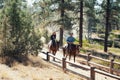 Horseback ride in Bryce Canyon National Park. Tourists explore uniquely beautiful landscape
