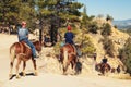 Horseback ride in Bryce Canyon National Park. Tourists explore uniquely beautiful landscape