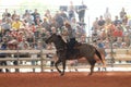 Cowboy horseback riding at the rodeo