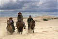 Horseback riding in desert