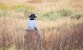 Horseback Riding in Tall Grass Royalty Free Stock Photo