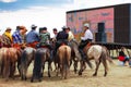 Horseback spectators in front of screen, Nadaam ho