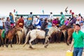 Horseback spectators watching Nadaam Horse Race