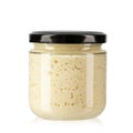 Horseradish in a jar. Isolated on white background Royalty Free Stock Photo