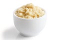 Horseradish sauce in small white bowl in perspective. Royalty Free Stock Photo