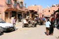 Horses and carts parked in city side street