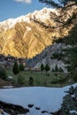 Horses is eating grass in front of wooden house in Fairy Meadows Royalty Free Stock Photo