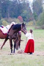 Horses graze on a meadow.