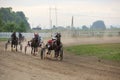 Yadrin, Chuvashia, Russia - August 13, 2022 : Horses and riders running at horse races