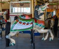 Horses on a traditional fairground B&B carousel at historic Coney Island Boardwalk in Brooklyn Royalty Free Stock Photo