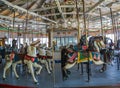 Horses on a traditional fairground B&B carousel at historic Coney Island Boardwalk in Brooklyn Royalty Free Stock Photo