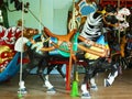 Horses on a traditional fairground carousel