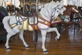 Horses on a traditional fairground Jane's carousel in Brooklyn