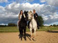 Horses and women Royalty Free Stock Photo