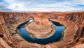 Horseshoe bend canyon giant stone loop panoramic view, looking down at Colorado river bend and red rock canyon, standing Royalty Free Stock Photo