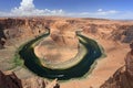 Horseshoe Bend on the Colorado River near Page Arizona on sunny late morning Royalty Free Stock Photo