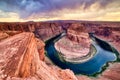 Horseshoe Bend on Colorado River at Sunset with Dramatic Cloudy Sky, Utah Royalty Free Stock Photo